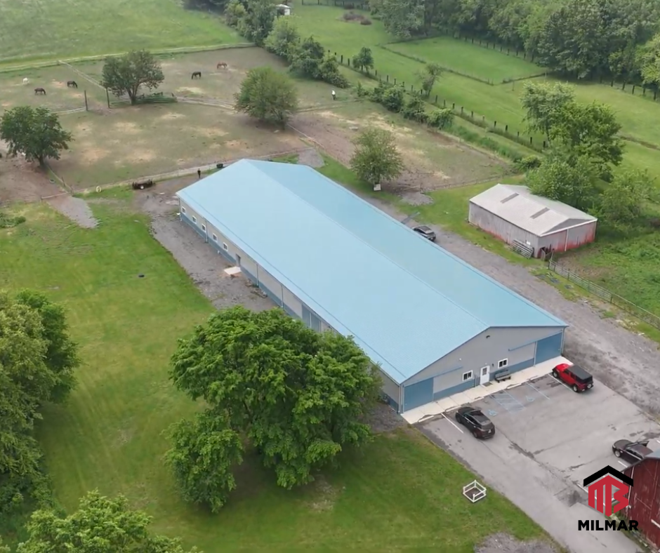 Aerial View Horse Barn Equestrian Facility by Post Frame Pole Barn Builder Milmar Buildings 70x72 Stables 70x120 Arena
