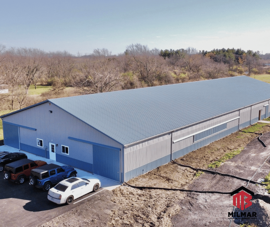 Website Large Horse Barn and Arena Blue and Gray Pole Barn Post Frame Milmar Building