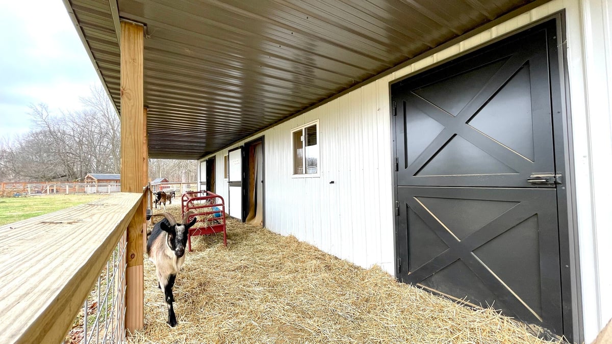 Black and White Agricultural Post Frame Barn Milmar